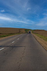Autumn landscape, road and highway, asphalt and roadside.