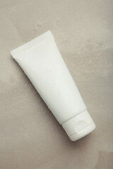 Mockup of beauty fashion cosmetic makeup bottle lotion product with skincare healthcare concept on grey background. Vertical photo