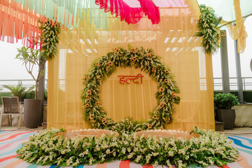 Haldi Decoration Ideas | Traditional Floral Setup, Marigold Haldi Decor, Wedding Haldi Stage, Yellow Theme, Bride & Groom Ritual Backdrop, Mehndi & Haldi Function