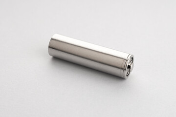 Blank metallic battery isolated on gray background