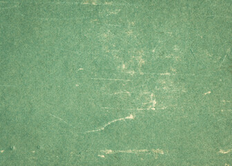 Abstract green grunge scratched background. Texture of vintage paper.