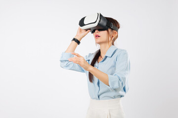 Happy woman with vr headset glasses virtual reality experience asian game, touching screen businesswoman exploring digital future with advanced vr tech, isolated studio white background