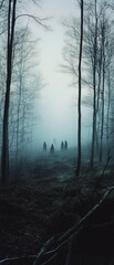 Obraz premium Eerie forest scene with mist and silhouetted figures, evoking a mysterious, atmospheric feeling.