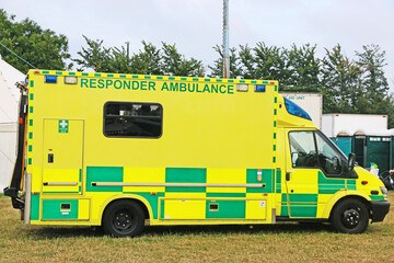 Ambulance standing in a field
