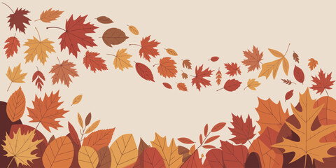 Obraz premium Autumn leaves in various shades of orange, yellow, and brown arranged in a decorative pattern on beige background