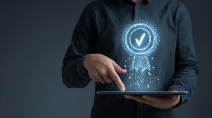 Person holding tablet displaying digital certification badge with checkmark image