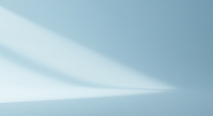 Serene Light Rays: Abstract Blue Gradient Background with Subtle Shadow Play