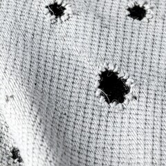 Fabric with intentional holes