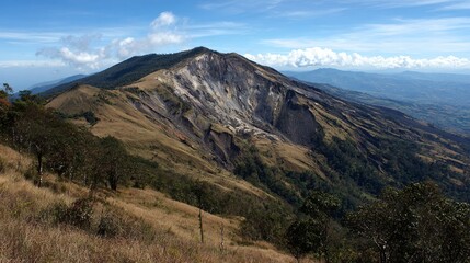 Obraz premium Scenic mountain landscape with blue sky nature hiking travel adventure outdoor wilderness natural environment photography tourism exploration eco trip