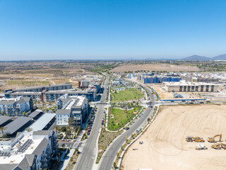 New development real estate. Aerial view of residential houses and driveways neighborhood in south San Diego, Chula Vista. Packed homes. Top view over private houses