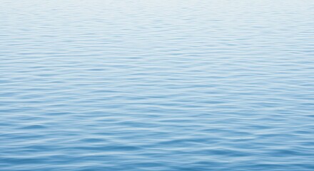 Naklejka premium Serene Water Surface, Gentle Ripples, Calm Blue Hues
