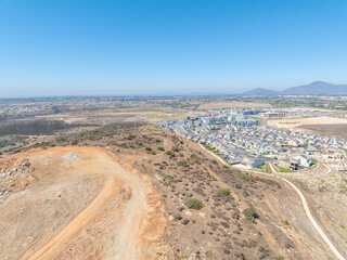 New development real estate. Aerial view of residential houses and driveways neighborhood in south San Diego, Chula Vista. Packed homes. Top view over private houses