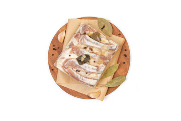 Traditional salted pork fat with spices isolated on white background