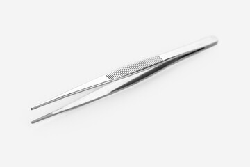 Cosmetic tweezers isolated on white background