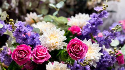 Vibrant floral arrangement with roses, chrysanthemums, and lavender in bloom