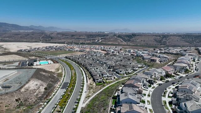 New development real estate. Aerial view of residential houses and driveways neighborhood in south San Diego, Chula Vista. Packed homes. Top view over private houses
