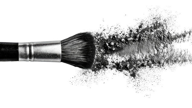 A makeup brush erupts in a cloud of dark grey powder - Powered by Adobe