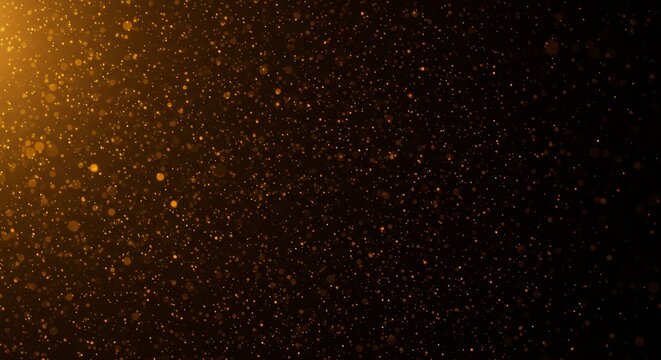 Golden Sparkle Dust Particles Illuminated by Warm Light on Dark Background.