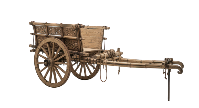 Ornate wooden cart with large wheels on a dark background