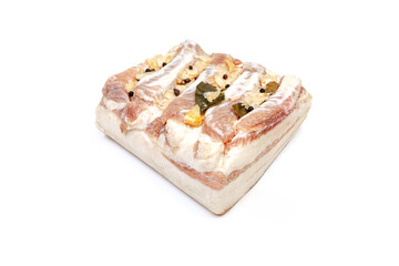 Lard or salo with bay leaf and black peas isolated on white background.