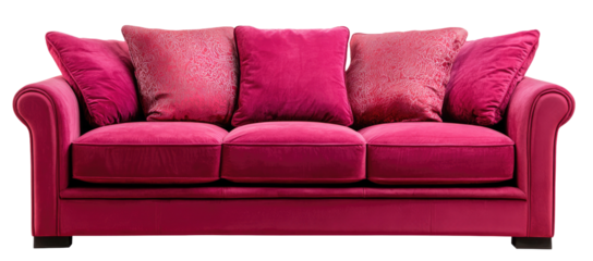 A vibrant fuchsia three-seat sofa with plush, patterned cushions