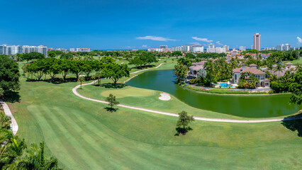 aerial drone view of a Golf Course in Boca Raton, Florida with city,