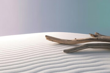 A weathered branch resting on a white sand dune under a soft blue and white gradient sky above it all