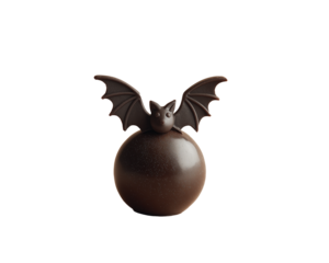 Dark chocolate bat candy isolated on white background. Halloween sweet dessert.