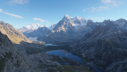 Obraz premium Stunning aerial view of majestic mountains with serene lakes under a bright blue sky