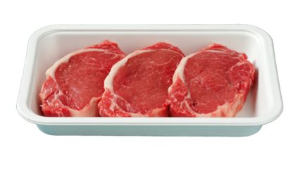 Three raw steaks in a white plastic tray