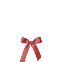 Coral pink ribbon bow on black background decorative