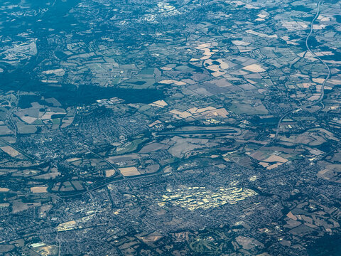 Aerial view of landscape around Slough and Windsor, a historic town in the Royal Borough of Windsor and Maidenhead in Berkshire, England with Windsor Castle, Dorney Lake and Royal Windsor Racecourse 
