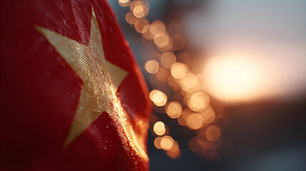 Vietnam flag with bokeh lights in background at sunset. National symbol waving in wind. Independence day and patriotism concept for banner.