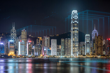 Night cityscape illuminated with skyscrapers reflecting in the water in hong kong china