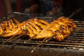Barbeque chicken wing sold in a night market