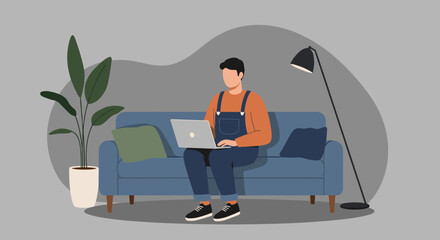 Young man comfortably working from home on a laptop, sitting on a sofa. Represents remote work, freelance, online learning, and modern digital lifestyle.