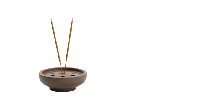 Incense burning in holder, white background, spiritual ritual concept.