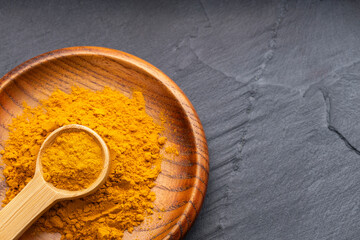Curcuma longa - Turmeric is a very healthy species in the spoon and bowl