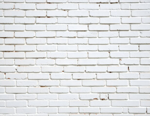 Naklejka premium A detailed full-frame shot of a white painted brick wall, showcasing its textured surface and subtle distressed elements, ideal for backgrounds or copy space.
