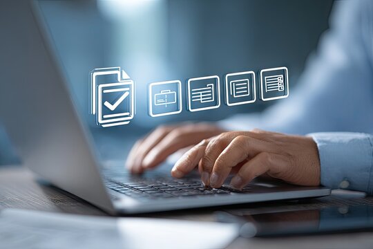 Person efficiently managing digital documents on laptop