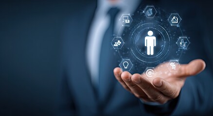 Person's hand displays a digital, holographic human figure surrounded by various business icons