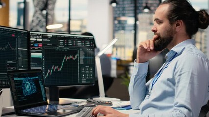 Portfolio manager in office using AI software on laptop to evaluate capital allocation based on economic graphs. Day trader using deep learning on notebook to do research driving growth, camera B - Powered by Adobe