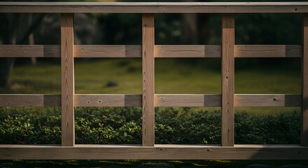 Fototapeta premium Wooden fence with horizontal slats and greenery background ideal for outdoor garden or yard privacy and decorative fencing solutions