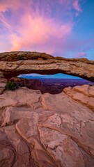 Obraz premium Scenic rock arch at sunset