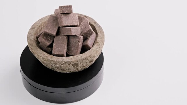 Traditional Indonesian Shrimp Paste Terasi on mortar stone