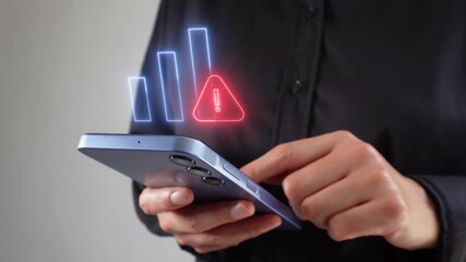 Financial results alert. Professional businesswoman checking her cell phone, with a virtual icon of charts with a warning sign. - Powered by Adobe