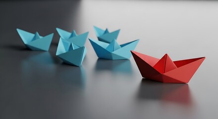 Red paper boat leading blue boats, leadership and teamwork concept