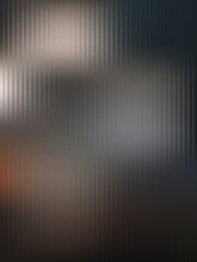 Abstract background with metallic gradient tones in dark and warm shades, featuring vertical striped texture for a sleek and modern look.