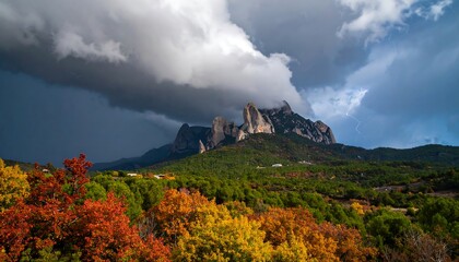 Autumnal Mountainscape Under Threatening Skies and Distant Lightning Strikes View