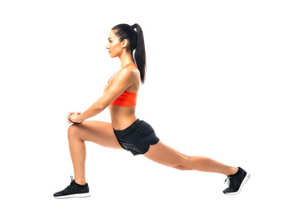 Fototapeta premium Fit woman performing a lunging stretch isolated on transparent background